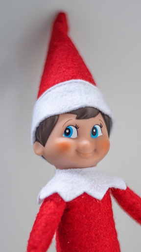 small toy elf on the shelf