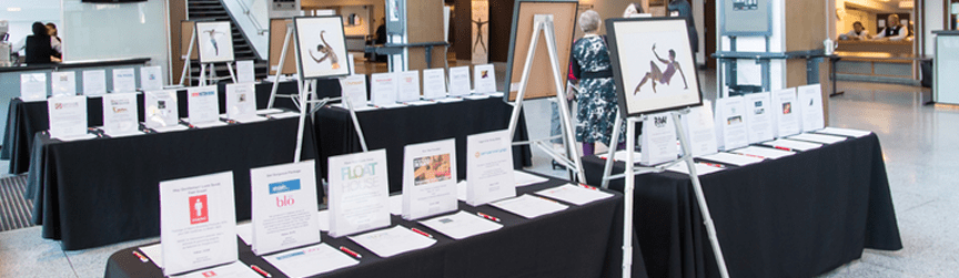 auction tables with items setup in large room