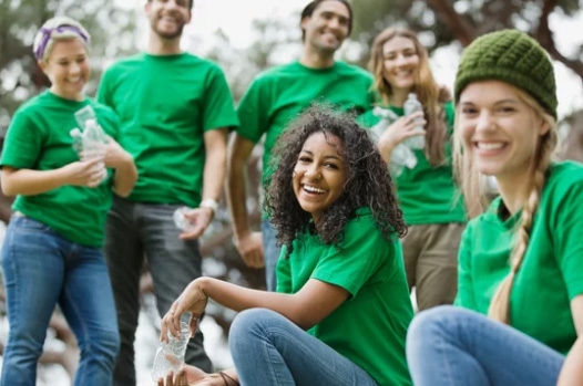 group of volunteers dressed to clean