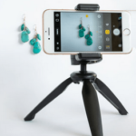 tripod with a smartphone in it