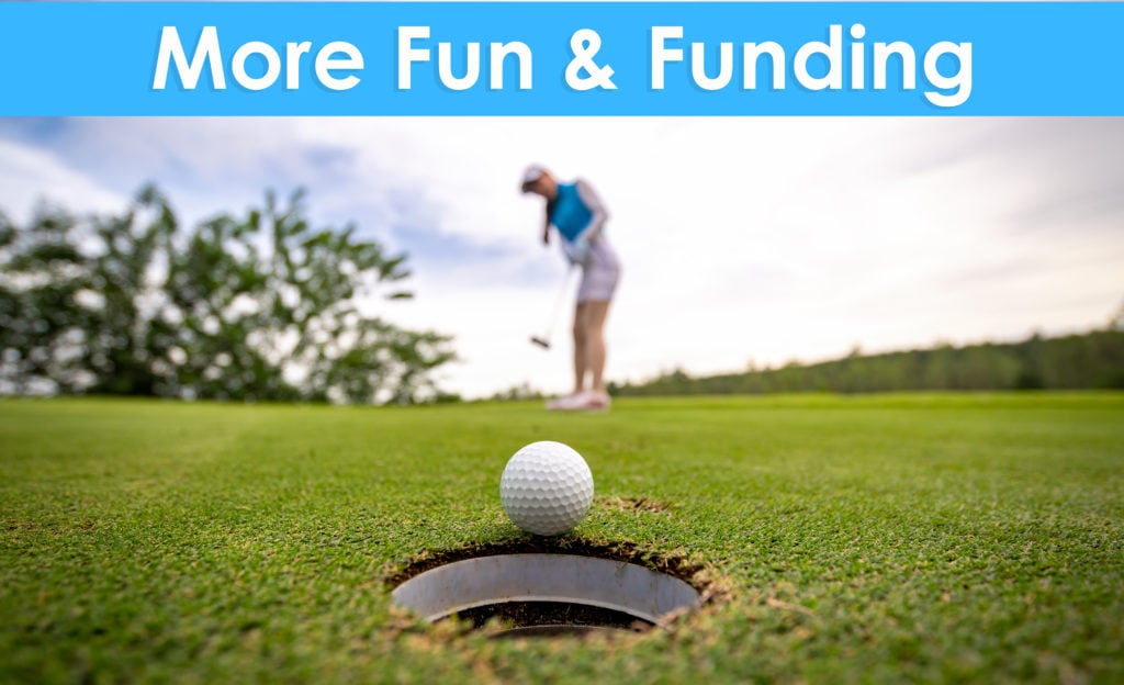 woman putting for a hole in one with blue banner on top that reas more fun and funding