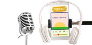 podcast mic and headphones illustration with smart phone showing a podcast on the screen
