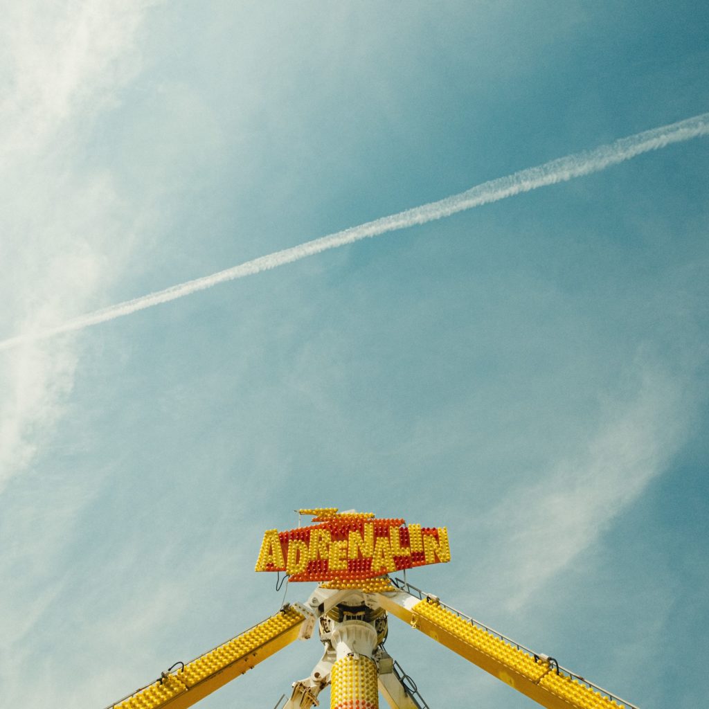 "Adrenalin" faire ride and blue sky