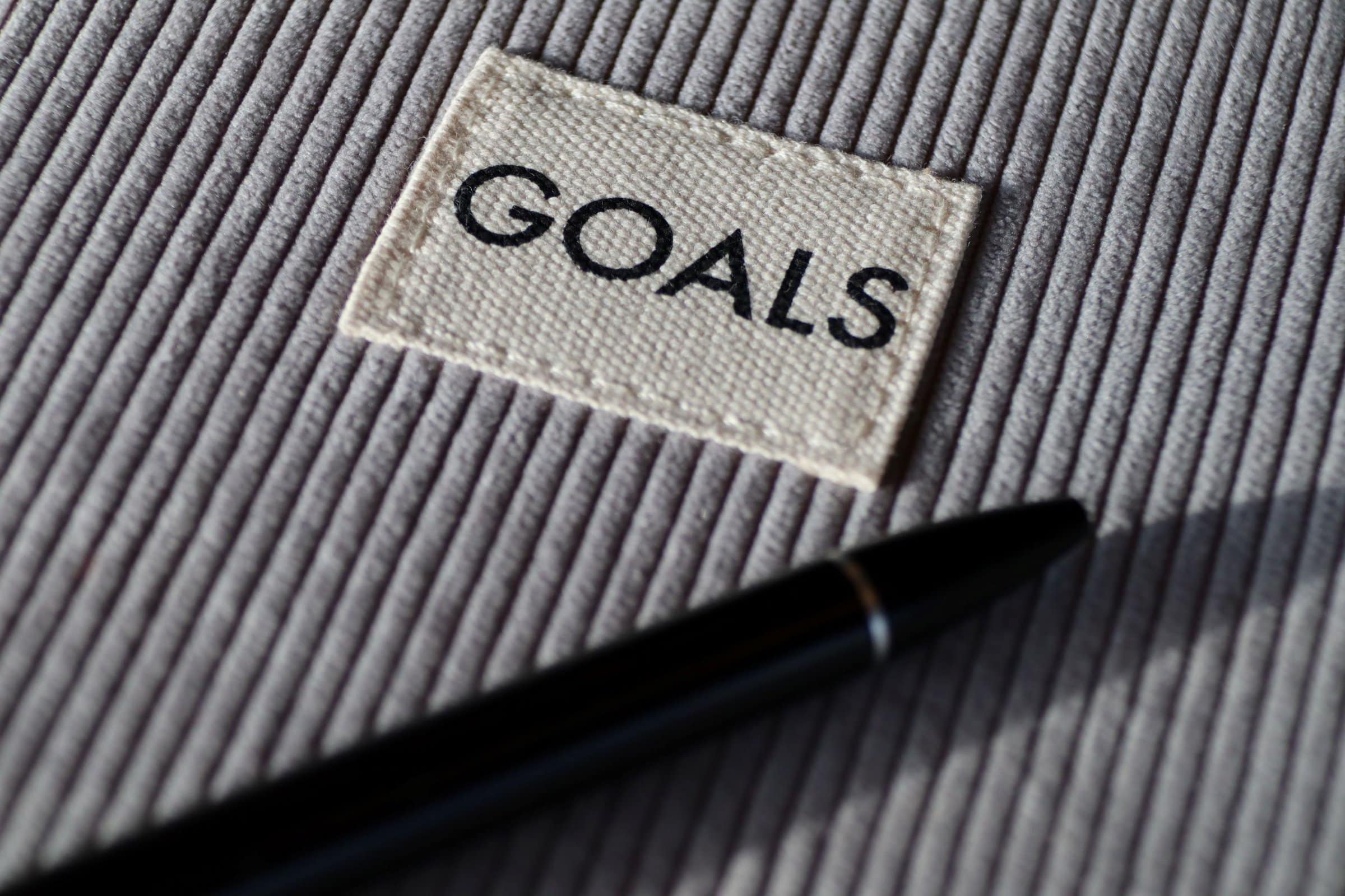 patch that says "goals" with pen