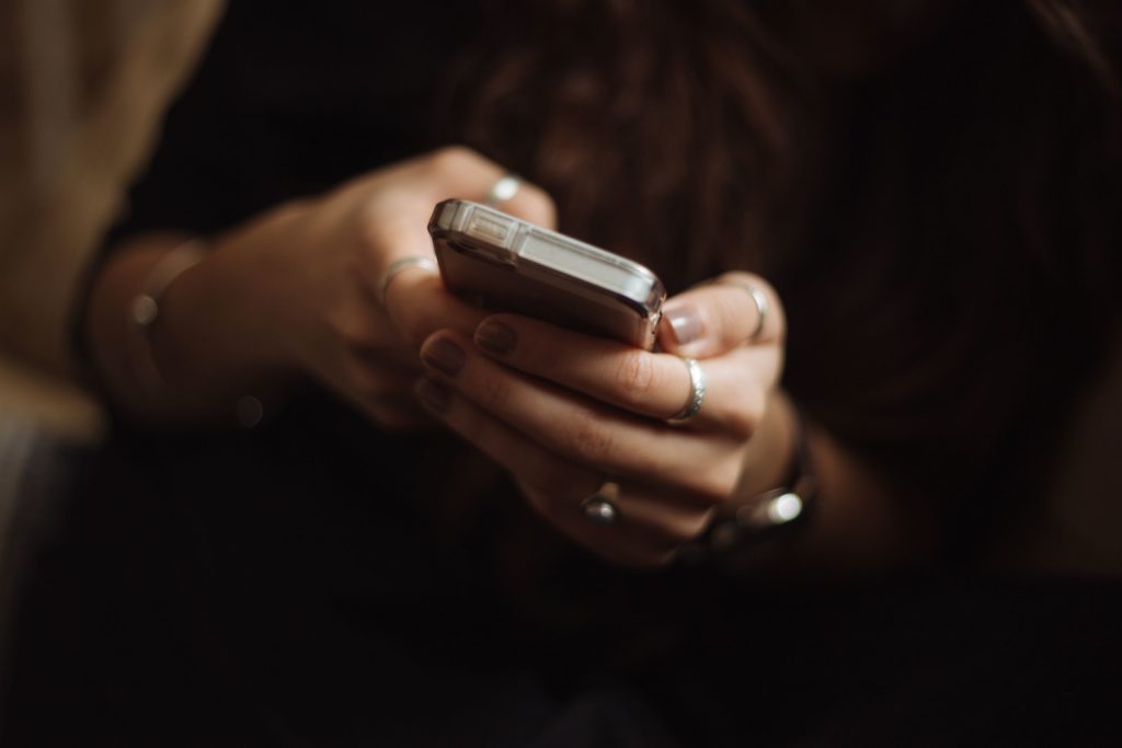 phone in woman's hand