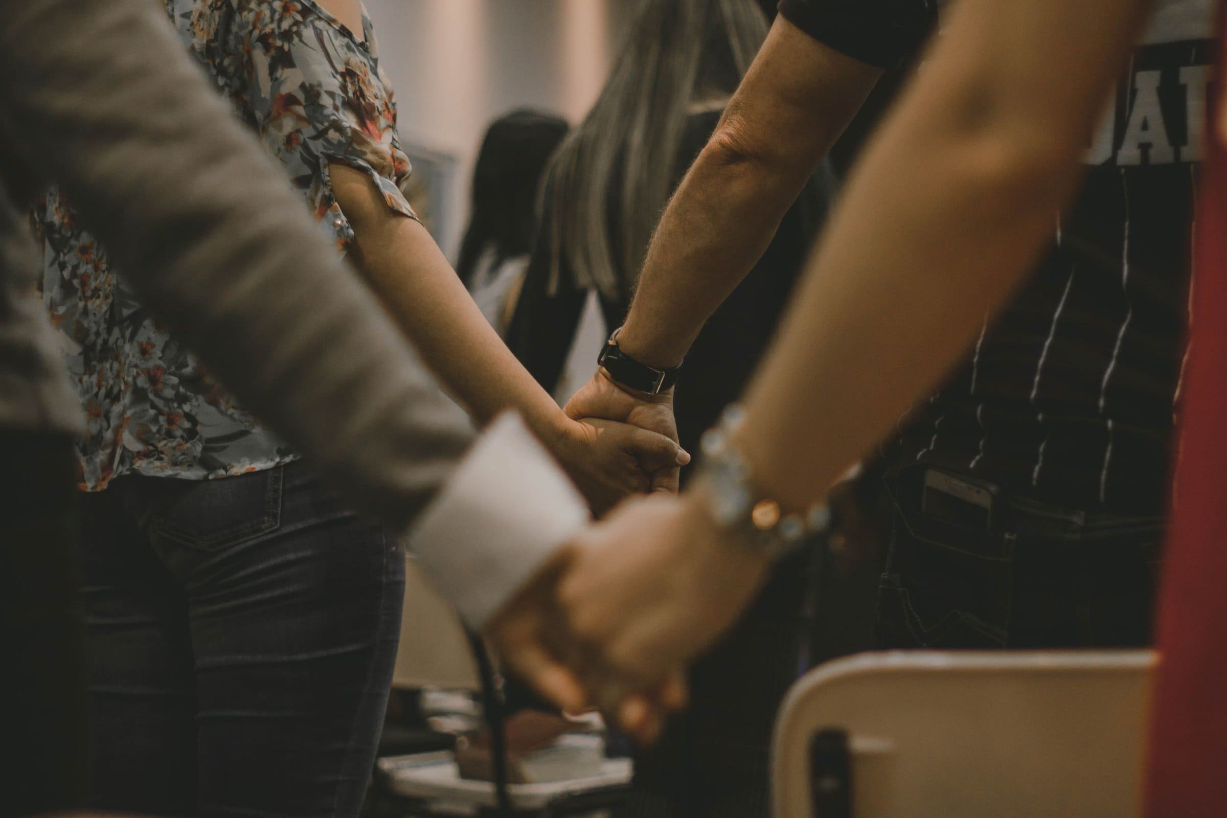 congregants holding hands