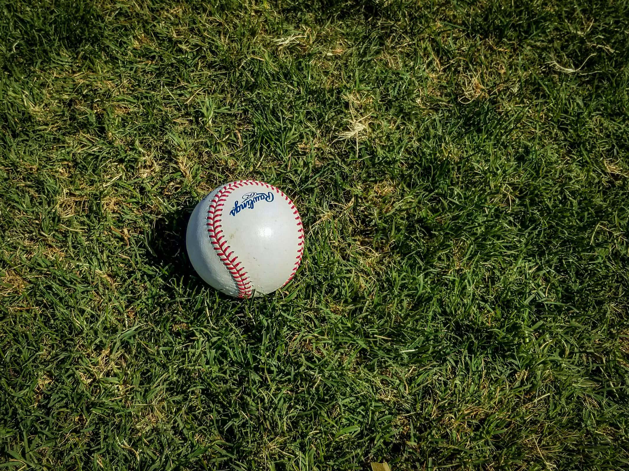 baseball lying on grass